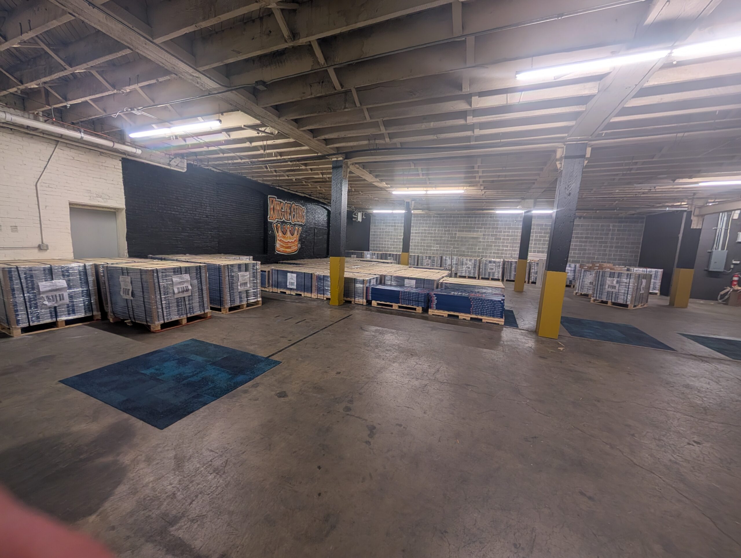 1800LVP flooring warehouse — pallets of luxury vinyl plank in stock